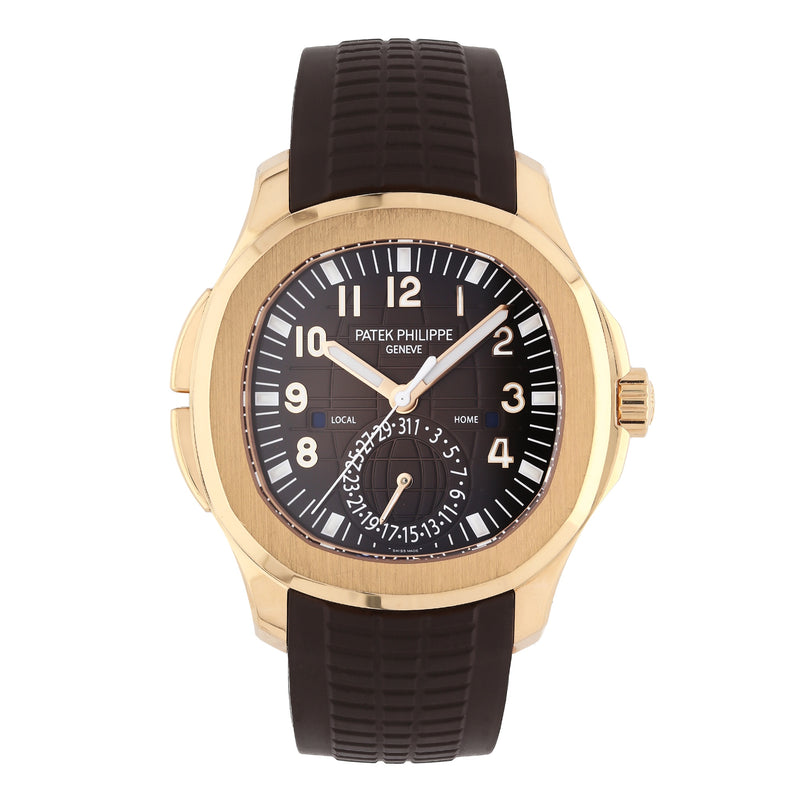 Rose Gold Patek Philippe watch with brown dial and rubber strap on a white background