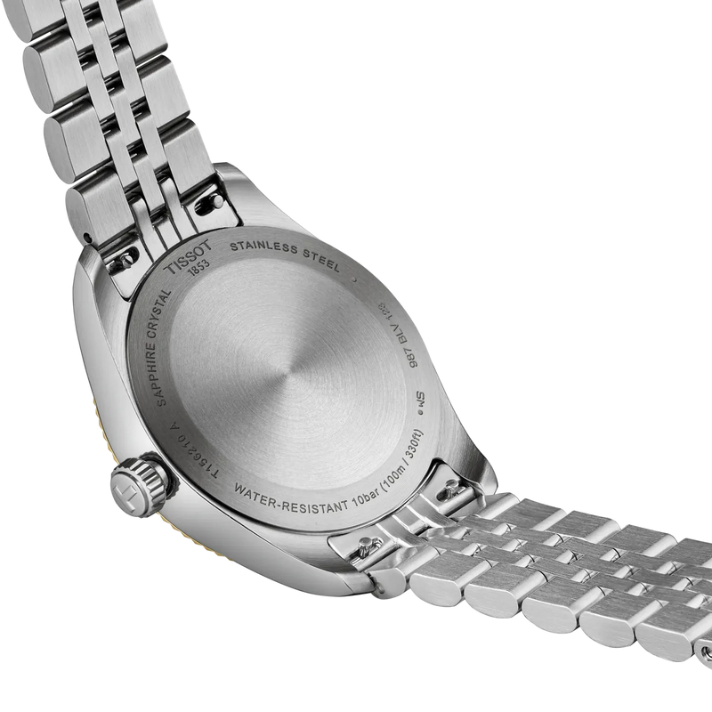 Rear view of the Tissot Ballade T156.210.22.031.00 showing the stainless steel case back, quick-release bracelet attachment and 100m water resistance.