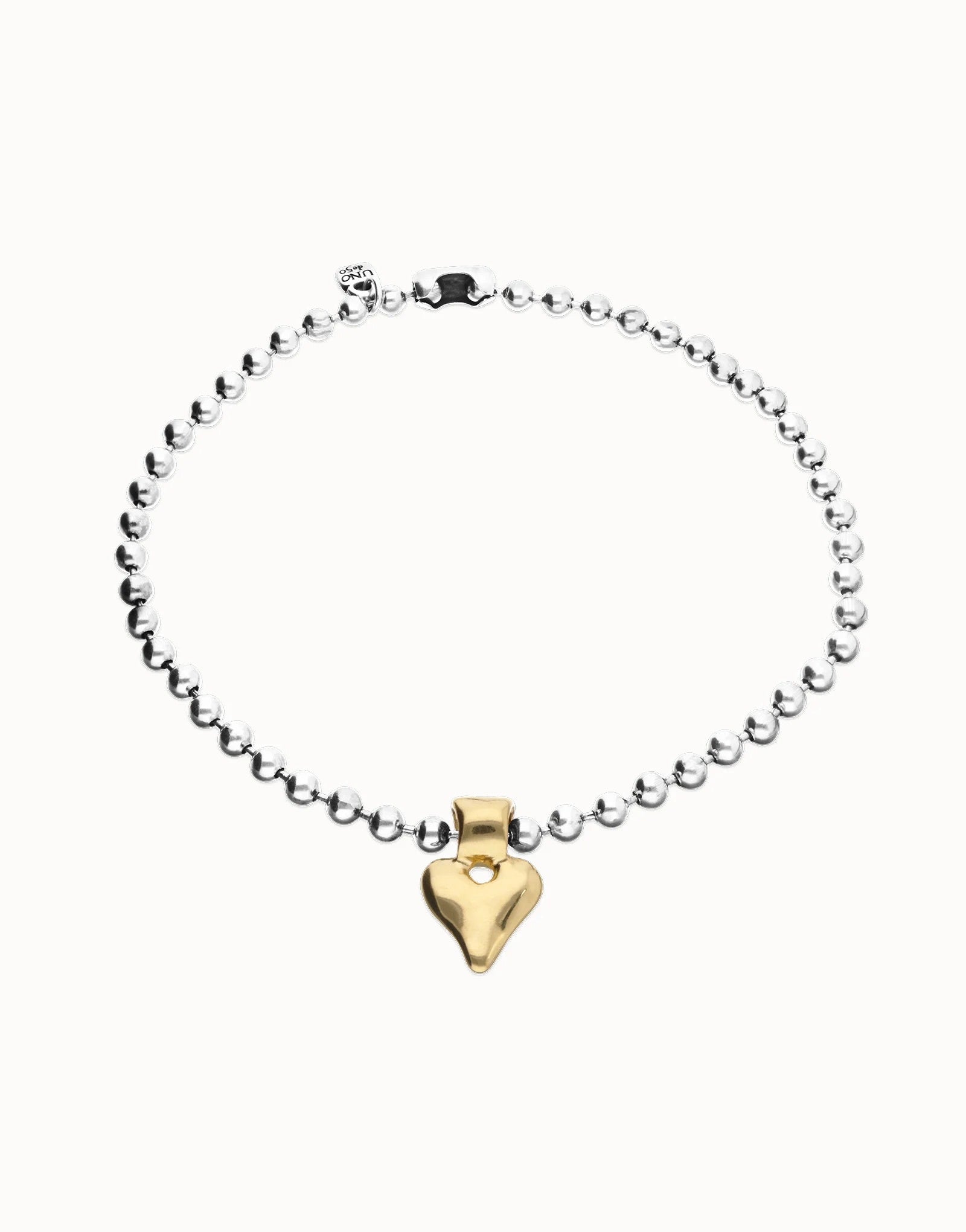 UNOde50 silver plated beaded necklace with gold plated heart pendant, front view.