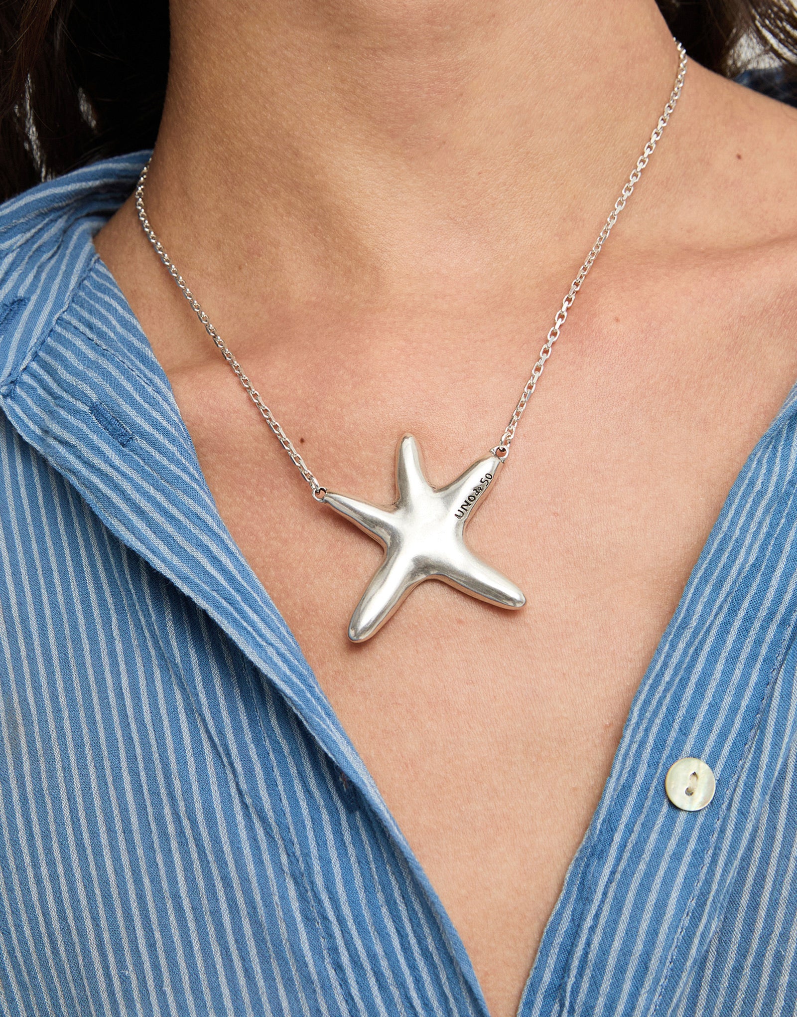 UNOde50 silver plated starfish pendant necklace with polished organic starfish design, front view.