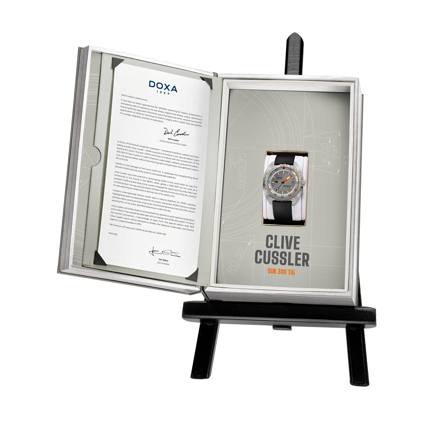 1. DOXA SUB 300 Ti5 Clive Cussler watch presented in its open special-edition display packaging with accompanying documentation.