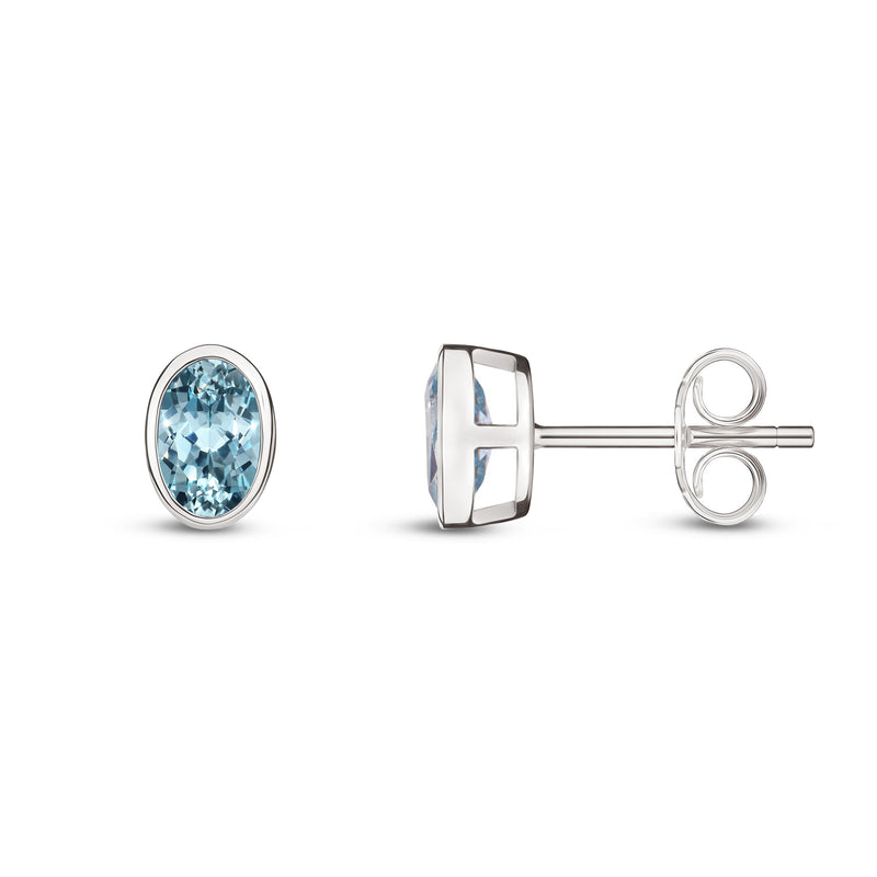 9ct White Gold Aquamarine Oval Rubover Stud Earrings 6x4mm