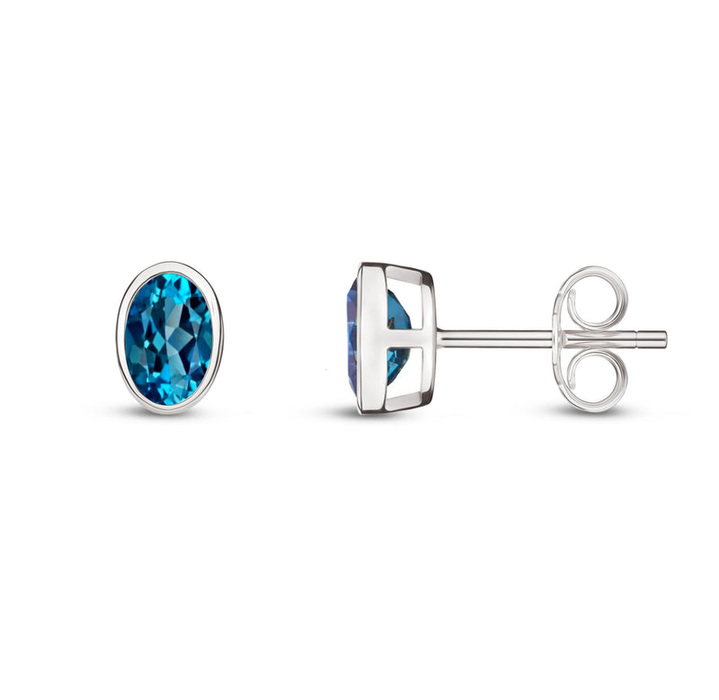 9ct White Gold London Blue Topaz Oval Rubover Stud Earrings 6x4mm