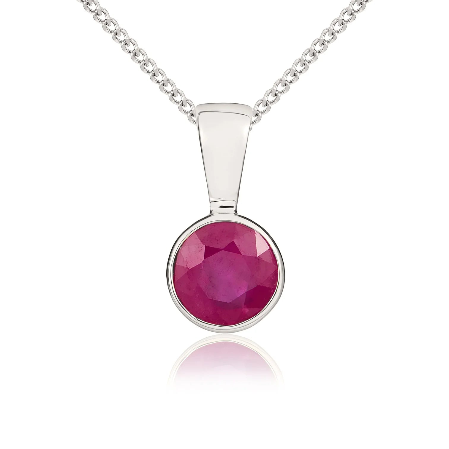 9ct white gold pendant featuring a round faceted ruby in a rubover setting, suspended from a white gold chain.