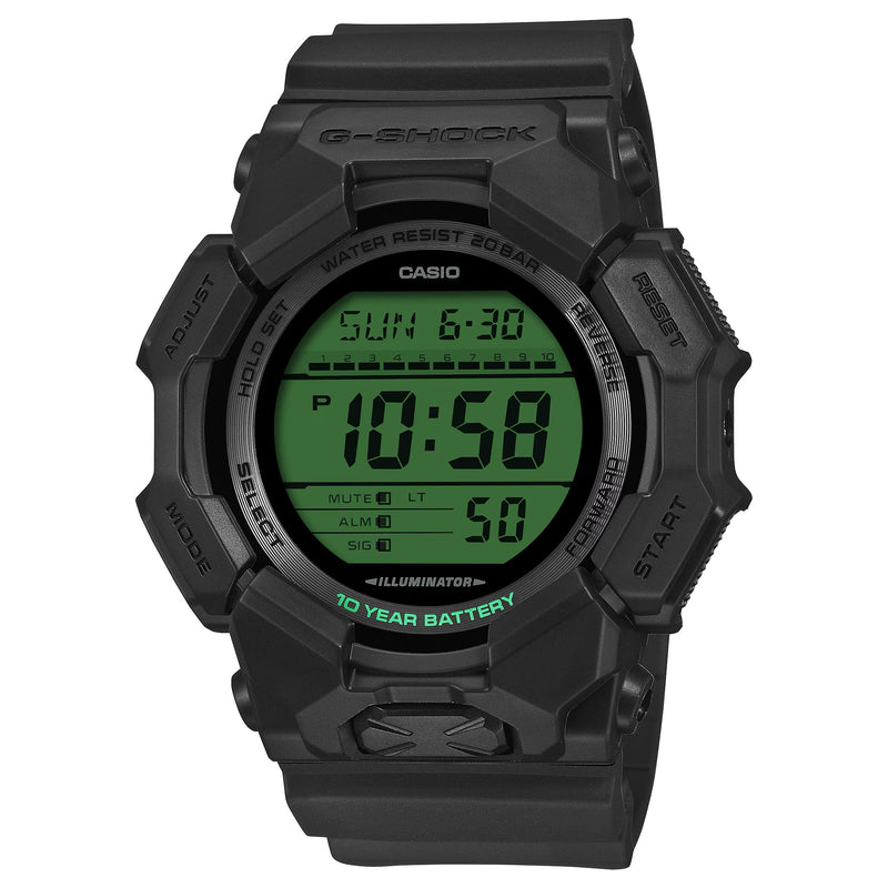 Black Casio G-Shock digital watch with green display on a white background
