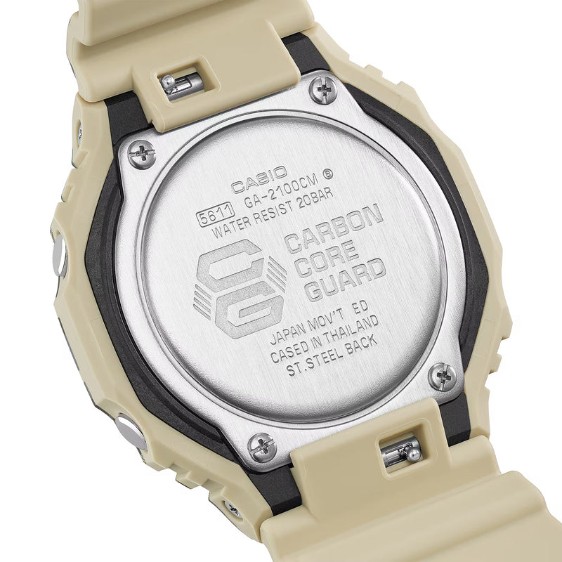 Casio G-Shock GA-2100CM-5A analogue-digital watch with beige camouflage resin case and strap, front view.