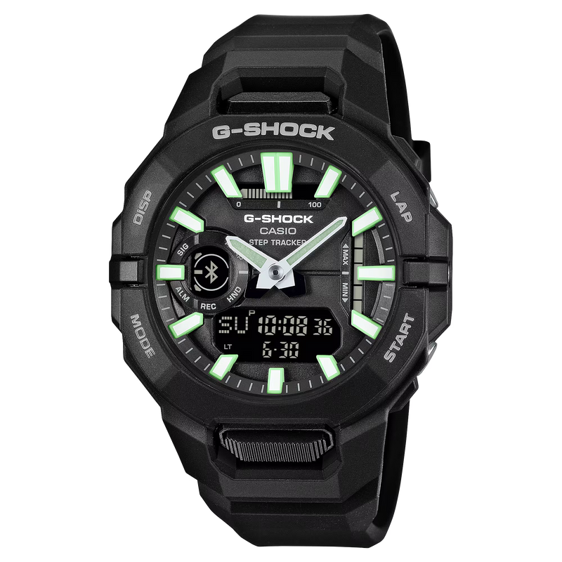 Black Casio G-SHOCK ana-digi watch with a black resin strap, green luminous hour markers, silver hands and digital display.