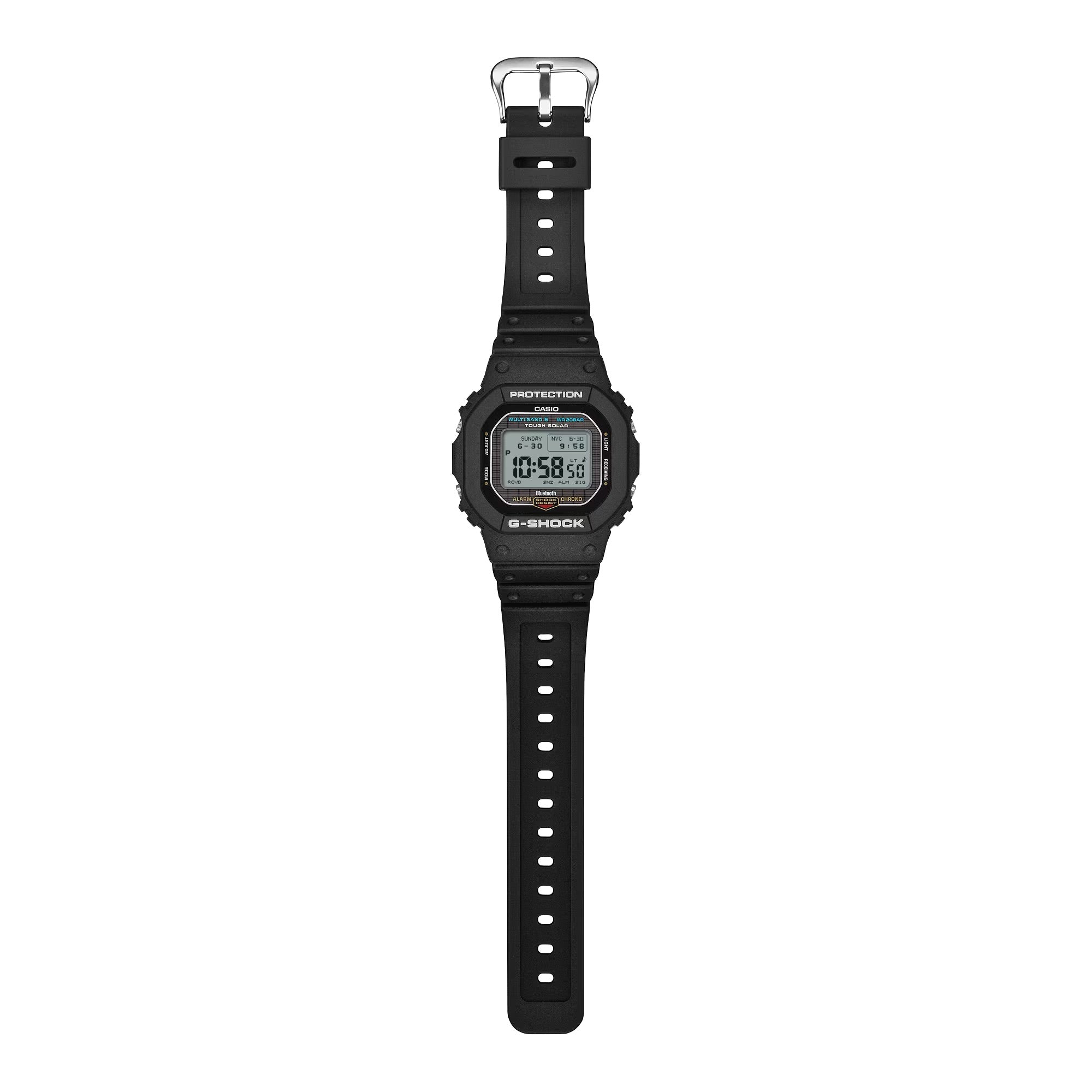 A black Casio G-Shock digital watch with a black strap and silver buckle, shown vertically against a plain white background.
