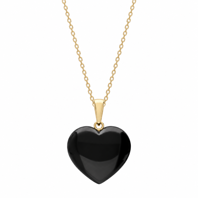 Whitby Jet heart-shaped keepsake pendant necklace with a smooth polished finish, yellow gold bail and delicate matching gold chain.