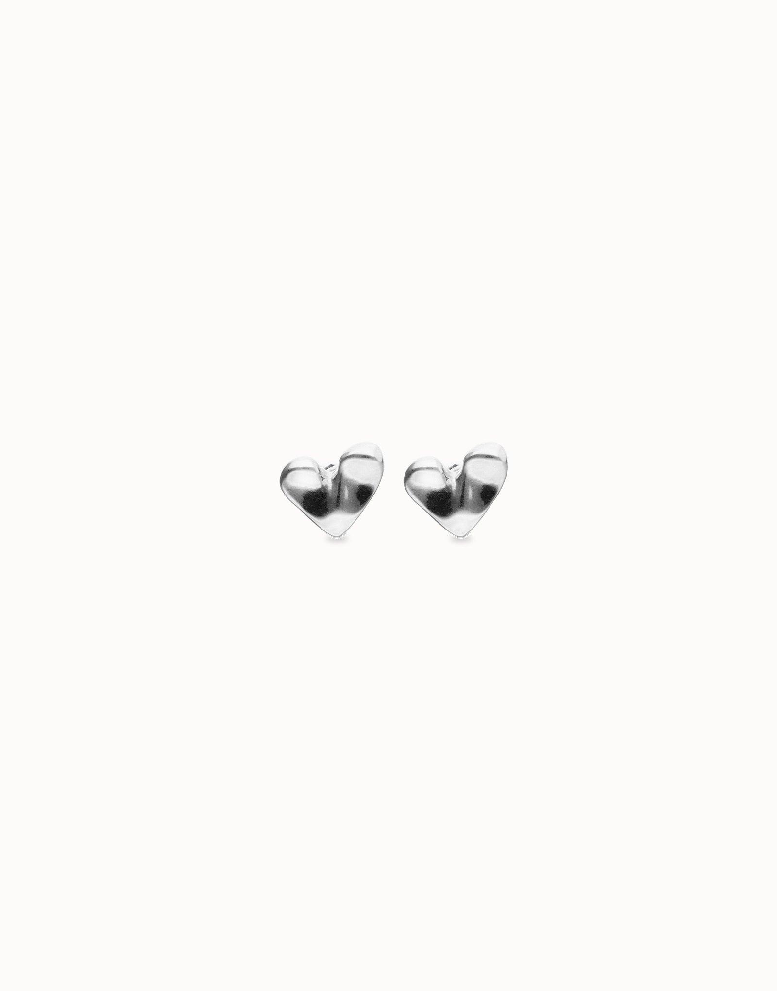 UNOde50 silver plated medium heart stud earrings front view with organic handcrafted heart design.