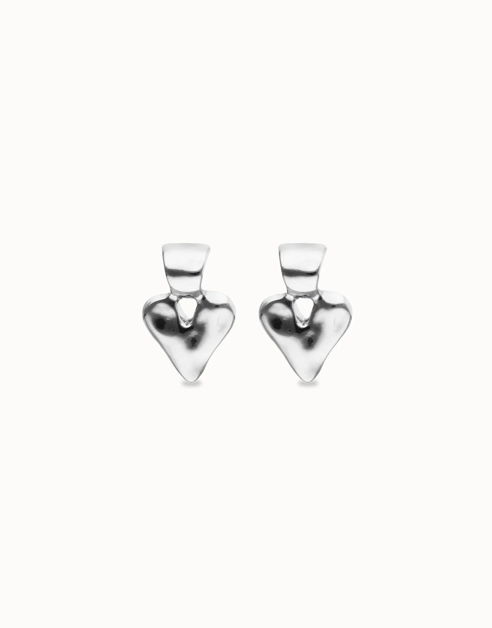 UNOde50 silver plated heart stud earrings with open heart detail and polished organic design, front view.