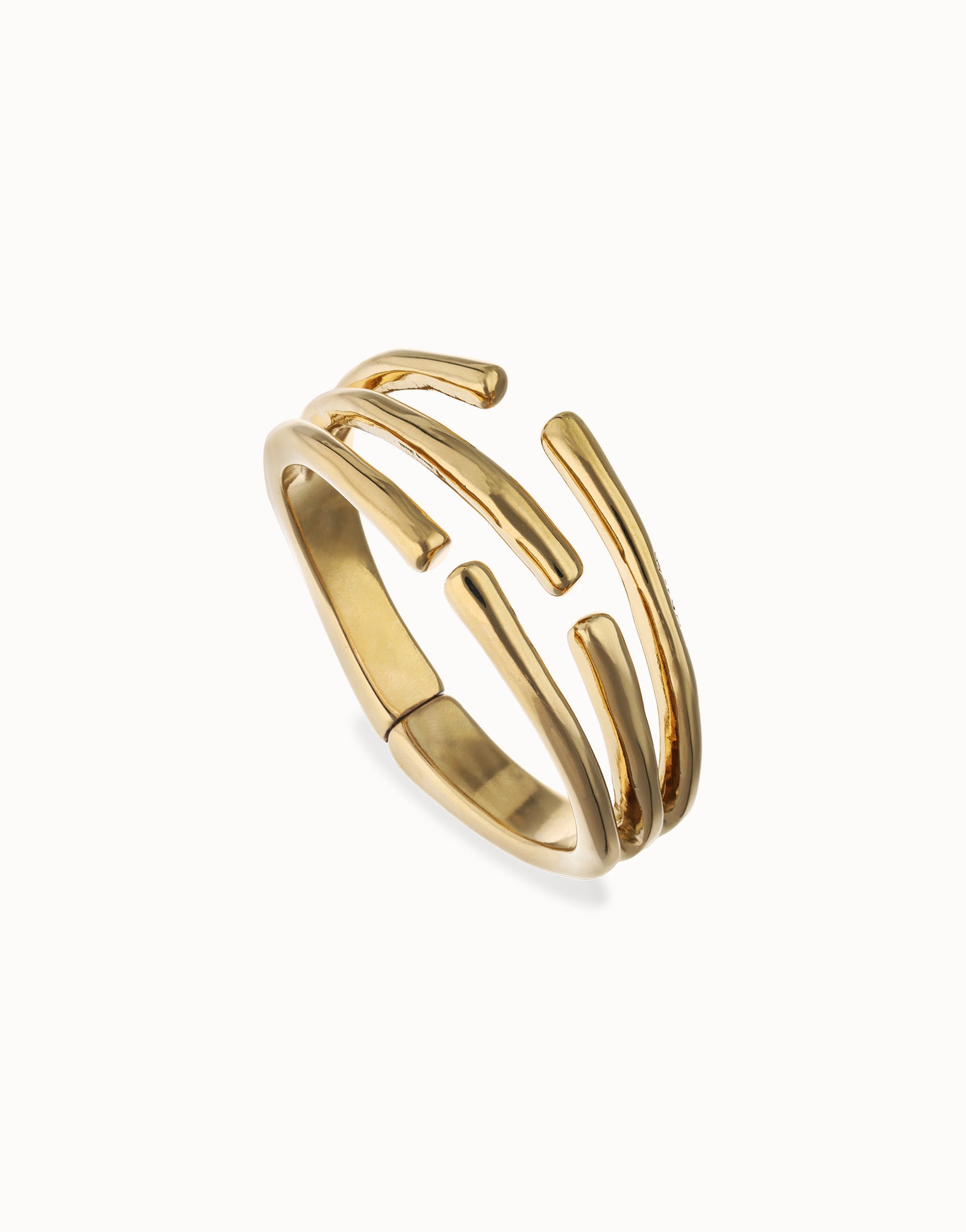 UNOde50 Organic gold plated three intertwined cuff bangle front angled view with sculptural open design.
