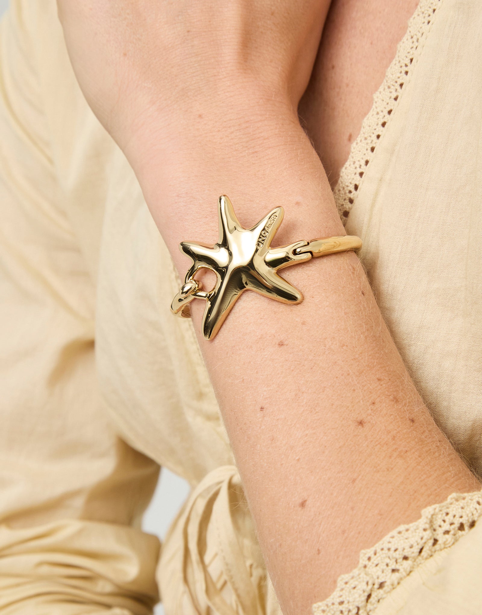 'Stellaris' Gold Starfish Bangle