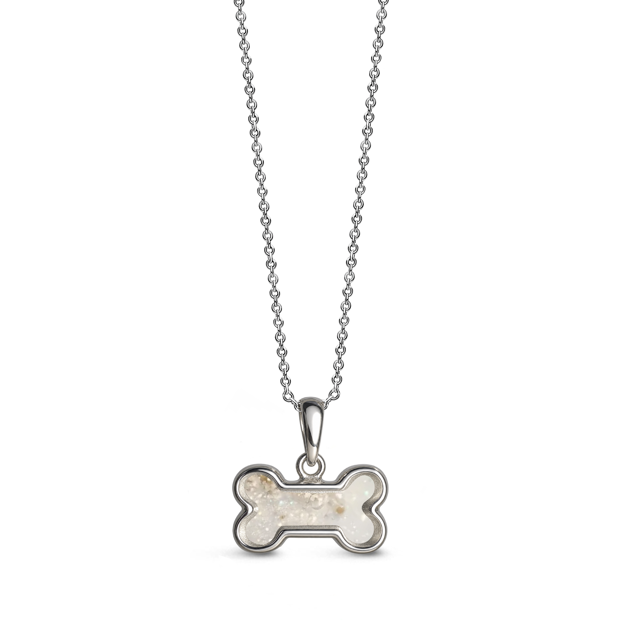 Sterling silver dog bone-shaped ashes keepsake pendant necklace featuring a opal glitter memorial setting with incorporated ashes and a polished silver border.