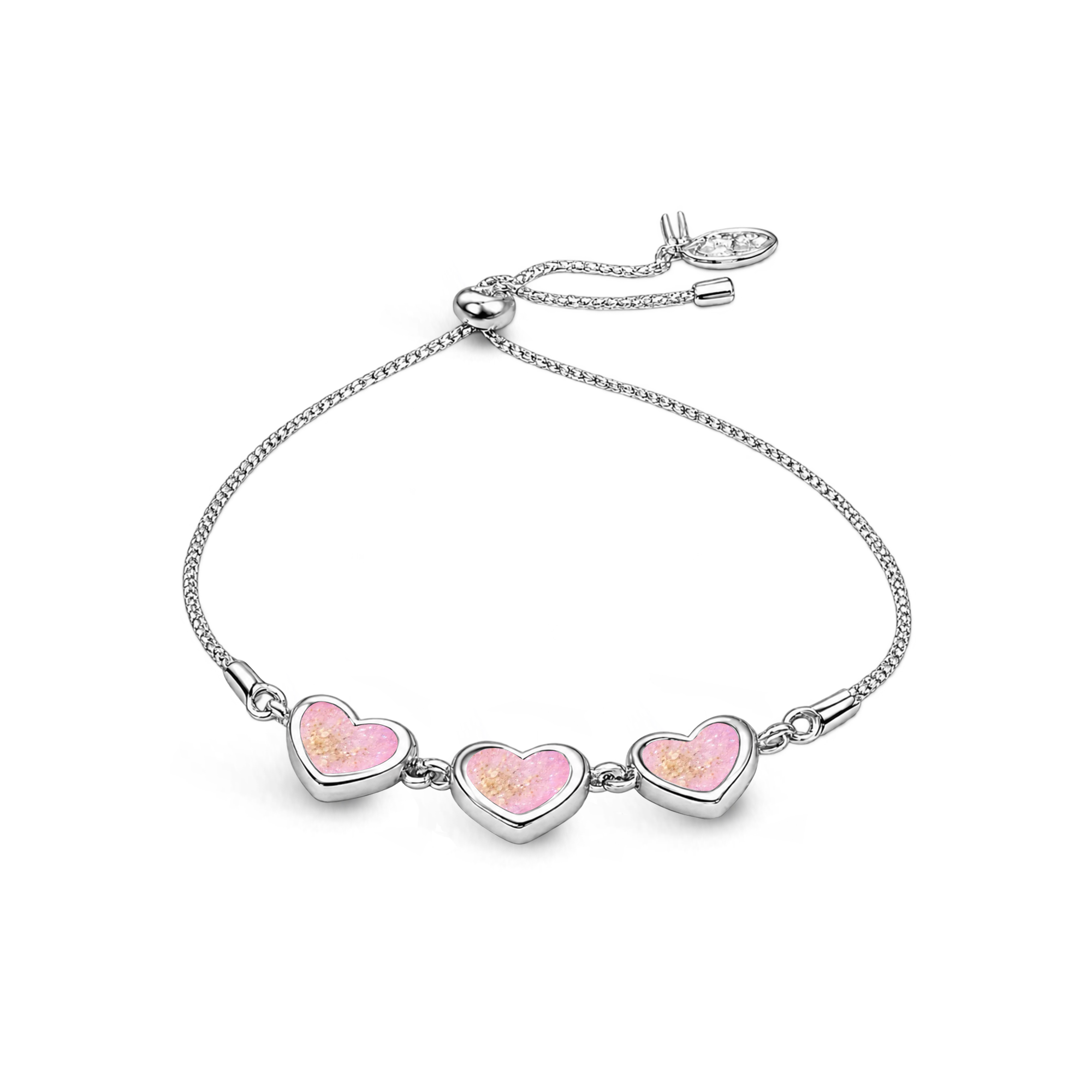 Sterling silver three-heart ashes keepsake bracelet featuring fuchia pink glitter memorial settings with incorporated ashes and an adjustable slider fastening. 
