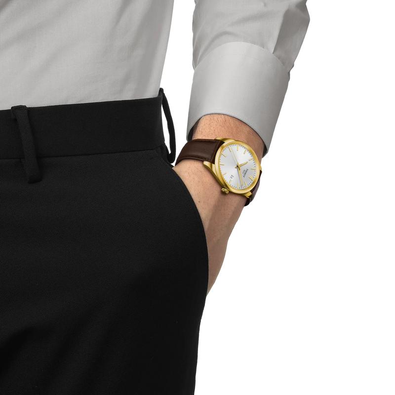 Tissot PR 100 40mm watch with silver dial, gold-tone case and brown leather strap