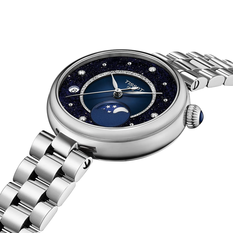 Tissot women’s stainless steel watch with blue moonphase dial, diamond markers and blue cabochon crown