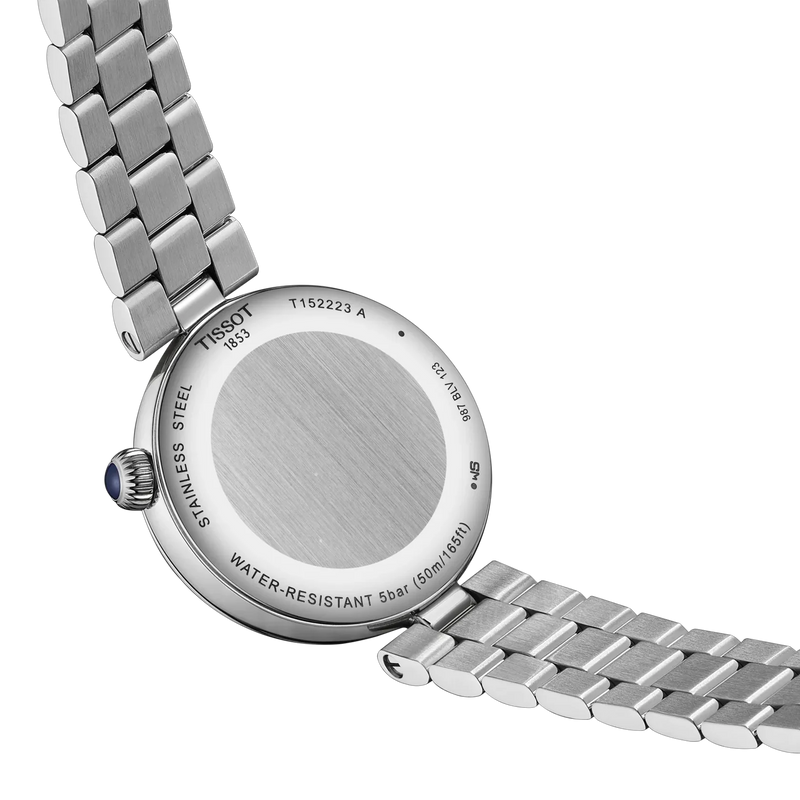 Rear view of Tissot women’s stainless steel watch showing case back and bracelet