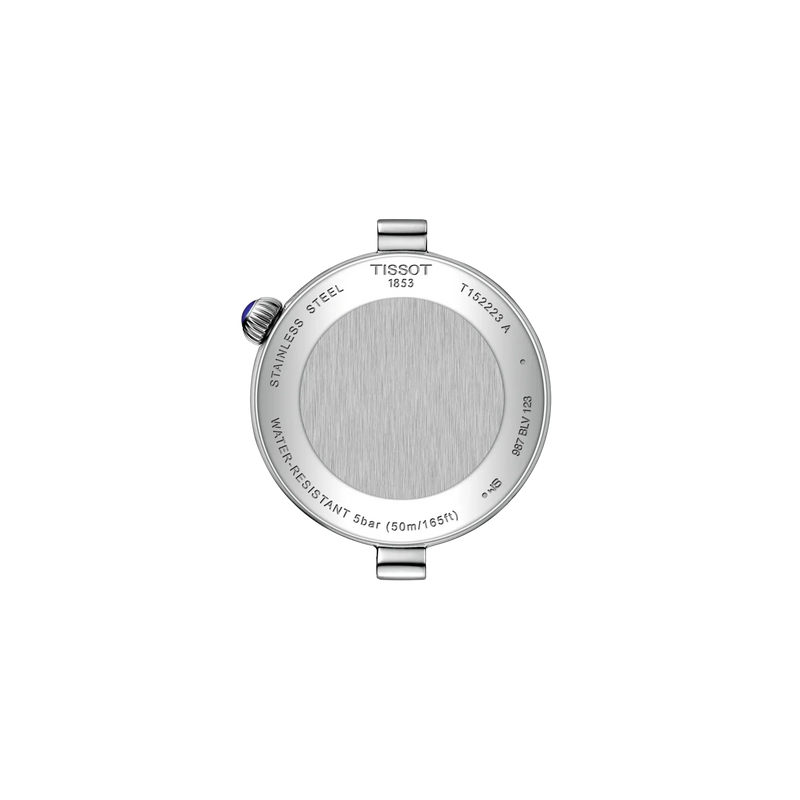 The back of a stainless steel Tissot watch case, showing the brushed metal finish, screw crown, and engraved text on a plain white background.